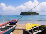 tropical beach scene, boats on beach